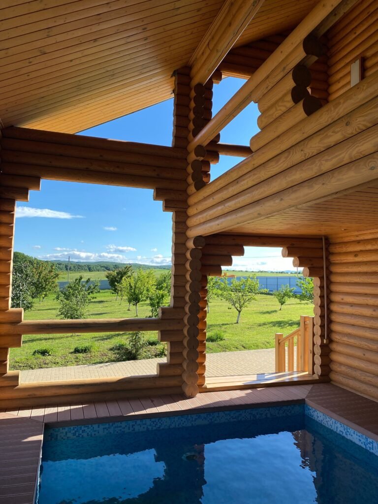 Modern longevity retreat facility interior featuring a cold plunge pool and infrared sauna.